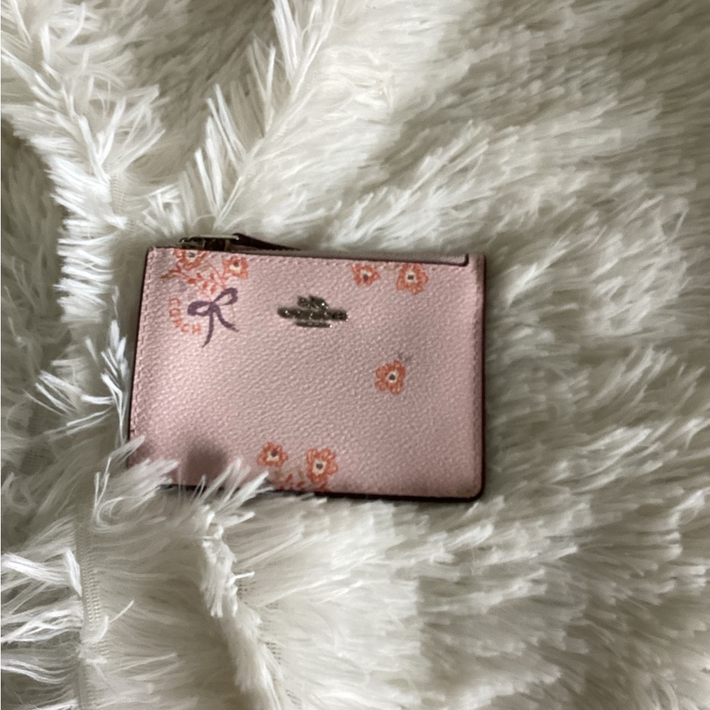 Coach floral ribbon ID case. Great accent piece.